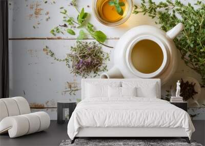 Teapot with its glass of tea on a white wooden table Wall mural