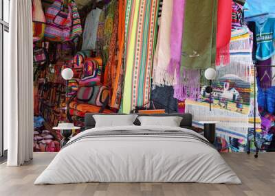 Market stall with colorful indigenous clothes, Argentina Wall mural