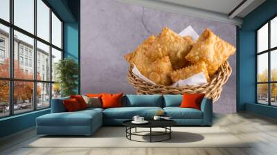 Traditional pastry called pastel  in Brazil. Brazilian snack. Brazilian pastry Wall mural