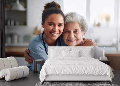 Nurse hugging elderly patients during visit at home Wall mural