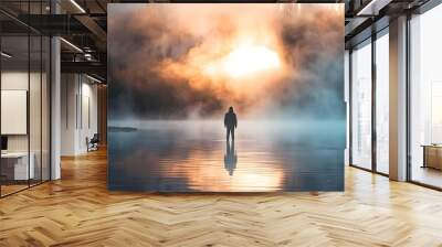 Silhouette standing in serene misty waterscape Wall mural