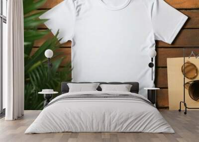 A white t - shirt with a white t - shirt hanging on a wooden wall. Wall mural