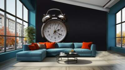 Retro alarm clock in dark background.For time concept. Wall mural