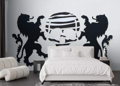 black and white skull head silhouette with two black heraldic lion shapes Wall mural