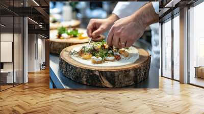 Chef garnishing a beautifully plated dish with precision, demonstrating culinary expertise in a professional kitchen. World Vegetarian Day Wall mural