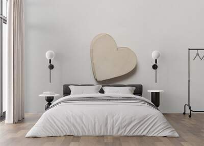 plain wooden hearts isolated on a light background Wall mural