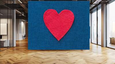 red felt heart on blue jeans background Wall mural