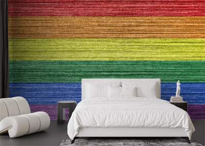 Rainbow LGBTQ or gay pride flag on scratched metal texture. Abstract background. Wall mural