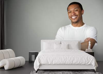 Trendy Happy and Fun Black Male Wearing A White Top Wall mural