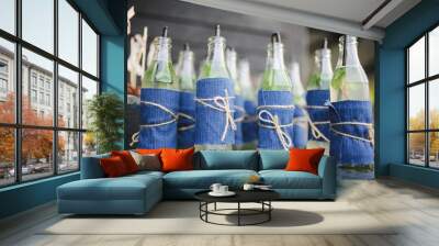 drink bottles boho style at a wedding reception party Wall mural