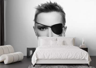 beautiful woman with eye patch and short hair. black and white portrait Wall mural