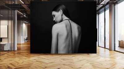 beautiful woman with necklace on her naked back Wall mural