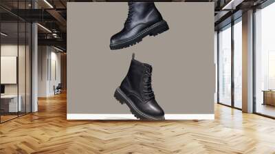 Black boots in the air. fashion shoes still life Wall mural