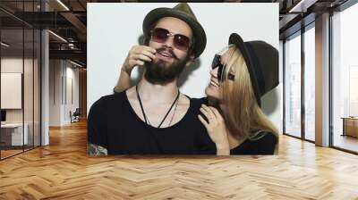 fashion beautiful happy couple in hat.Hipster boy and girl Wall mural