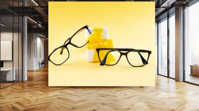 Black Eyeglasses  On Yellow Background  Wall mural