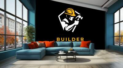 Logo of a man use safety helmet with hammer in black isolated background Wall mural