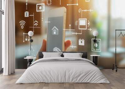 A hand holding an phone with smart home icons floating around it, Wall mural