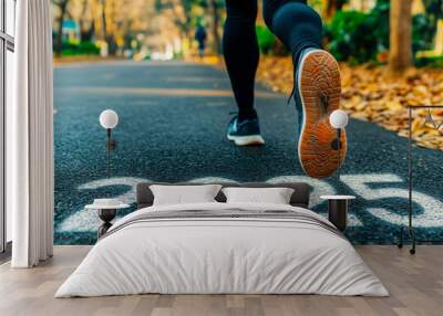 Close up of feet,, sportsman runner running on a road with the word 