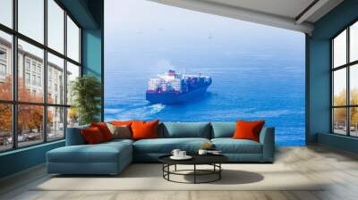 Container ship goes on Red Sea, bird eye view Wall mural