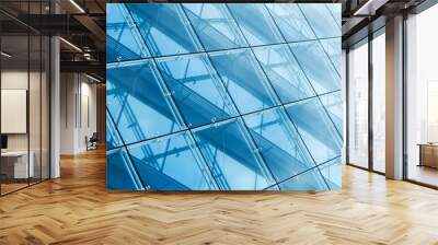 Curtain wall made of blue toned glass and steel Wall mural