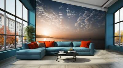 Dramatic colorful seascape. Sun, evening sky Wall mural