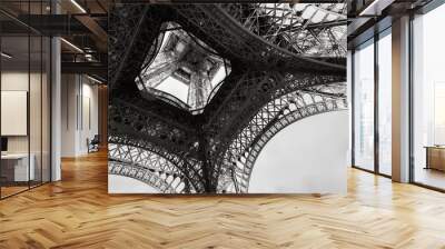 Looking up inside of the Eiffel tower Wall mural