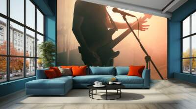 Rock bass guitar player on the stage Wall mural