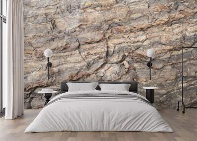 Rough brown stone wall, natural rock Wall mural