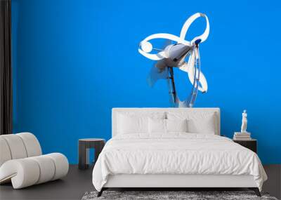 Small white wind turbine and solar battery Wall mural