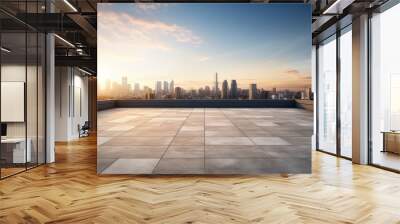 Empty floor tiles foreground and distant city sunset scenery Wall mural