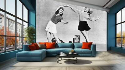 Two women dancing outside  Wall mural