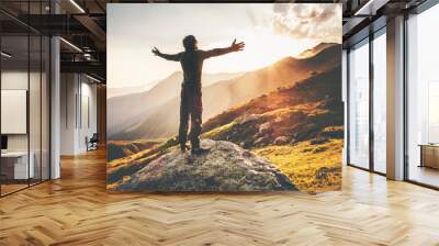 Happy Man raised hands at sunset mountains Travel Lifestyle emotional concept adventure summer vacations outdoor hiking mountaineering harmony with nature Wall mural