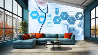 Doctor with a stethoscope in the hands and office background Wall mural