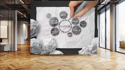 hand draws gear business success chart concept on crumpled pape Wall mural