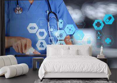 Medicine doctor hand working with modern computer interface as m Wall mural