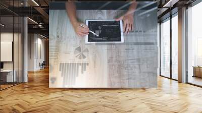 top view of Designer hand working with digital tablet computer w Wall mural