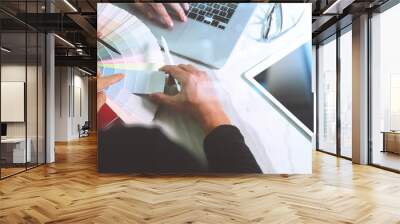 two colleague web designer discussing data and digital tablet an Wall mural