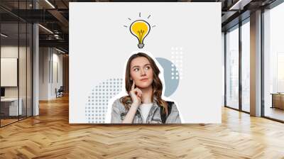 collage thinking girl with a light bulb above her head isolated on white background Wall mural