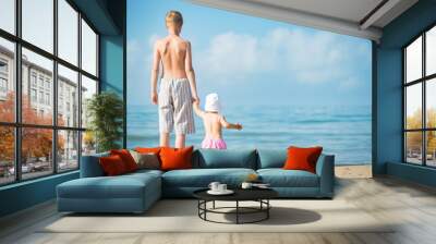 Two children on the beach Wall mural