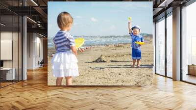 Two kids playing Wall mural