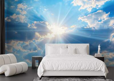 Captivating blue sky with fluffy clouds, bathed in sunshine and adorned with radiant sunbeams and rays. Perfect backdrop for design projects, exuding tranquility and natural beauty. Wall mural