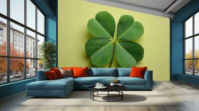 Small green four leaf clover for good luck St. Patrick's day isolated background Wall mural