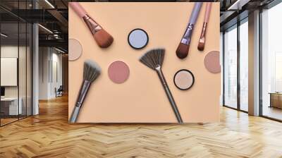 Fashion cosmetic makeup Set. Minimal. Beauty product on coral background. Trendy accessories Brushes Eyeshadow art fashionable Flat lay. Creative make up fall autumnal concept Wall mural