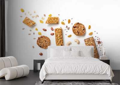 Granola bar with nuts and dry fruit berries flying. Energy cereal snack fall. Fitness diet food. Muesli bars isolated on white background. Levitation fly creative concept, top view Wall mural