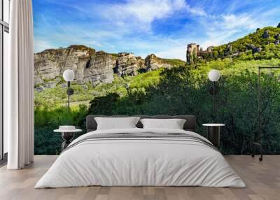 The Meteora is a rock formation in northwestern Greece, hosting one of the largest and most precipitously built complexes of Eastern Orthodox monasteries, second in importance only to Mount Athos. Wall mural