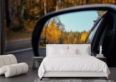 look in the rear view mirror of a car Wall mural