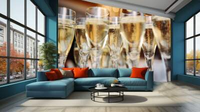 champagne glasses on a background of lights Wall mural