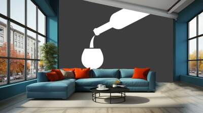 Bottle of wine and glass on black background. Wall mural