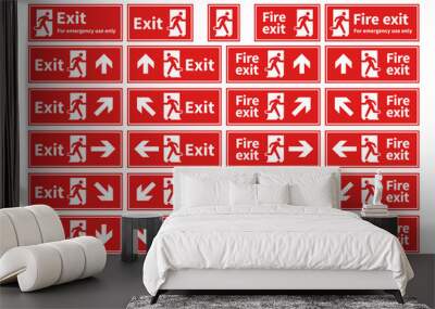 Set of emergency fire exit red signs with different directions on white Wall mural