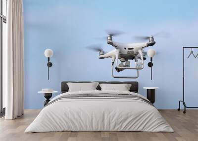 Phantom 4 Pro drone in flight. Drone with damage from falls and radio beacon.  Wall mural